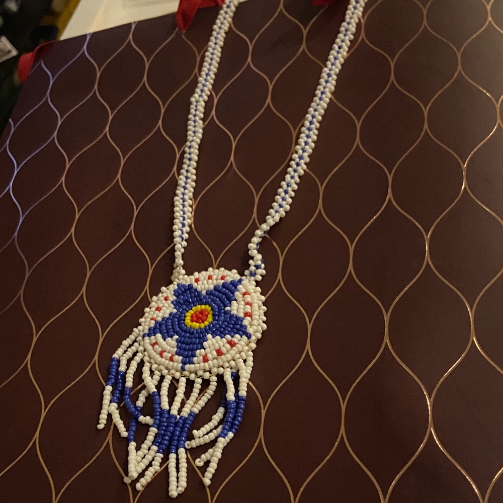 Elegant Beaded Necklace with Blue and White Floral Motif